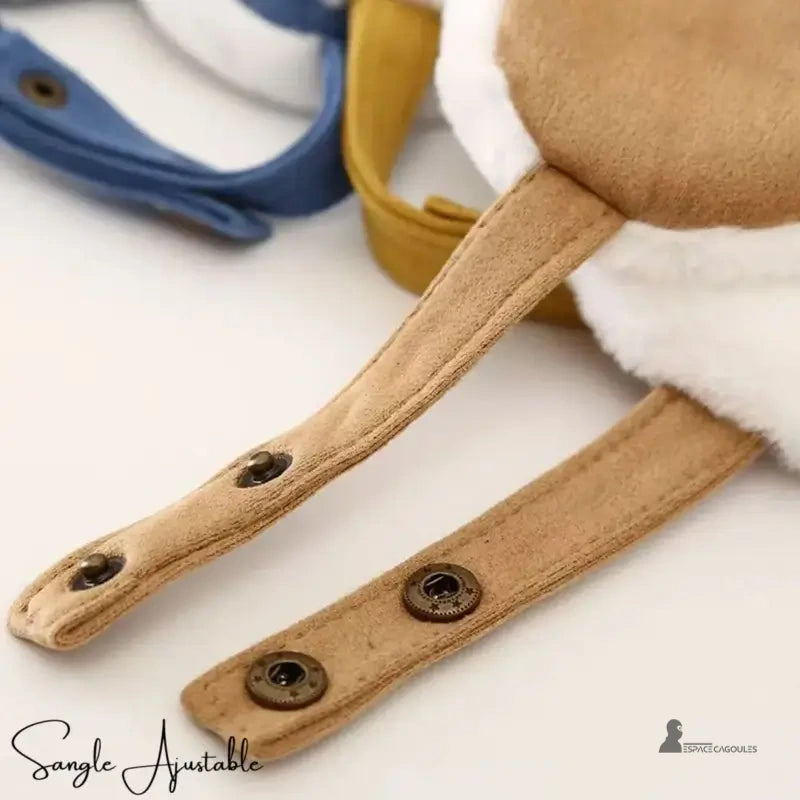 Children's reindeer hat detail of adjustable beige suede straps with press studs, luminous inner bottom