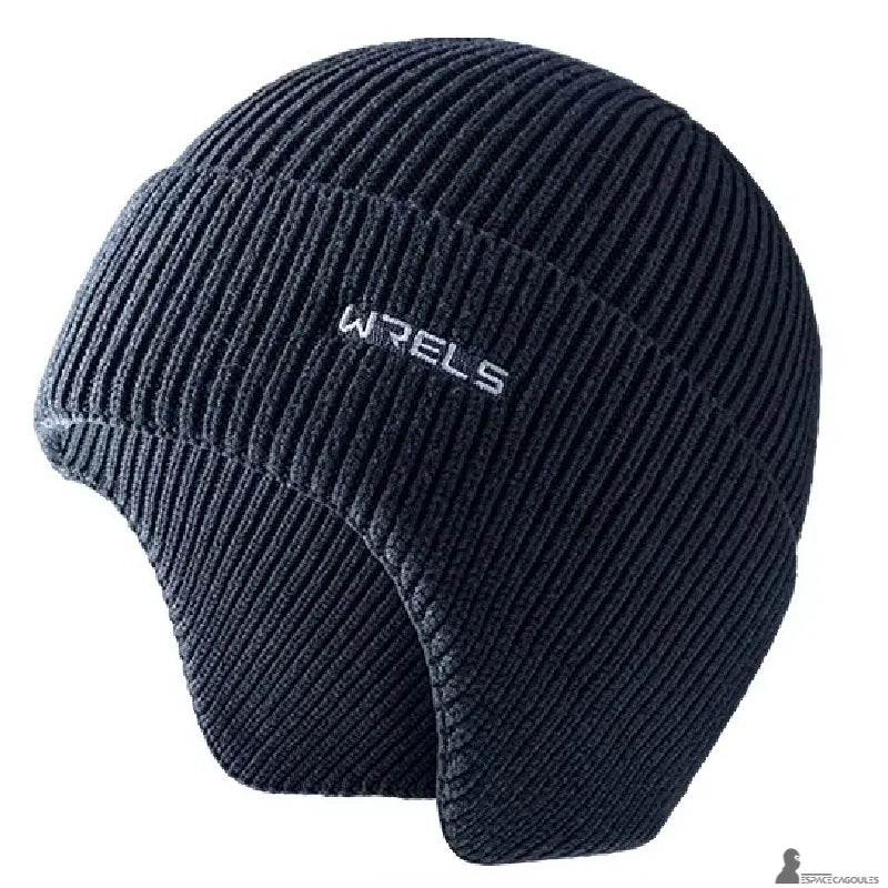 Bonnet sous casque ski bleu foncé en fibre synthétique tricotée, forme couvrante avec cache-oreilles, vue de profil sur fond blanc - Espace Cagoules