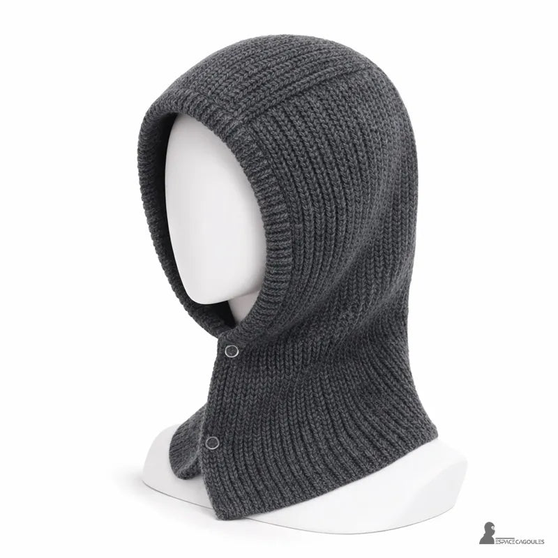 Passamontagna anni '90 grigio scuro in maglia su manichino vista di profilo con forma avvolgente dallo stile retrò - Spazio Cagoule