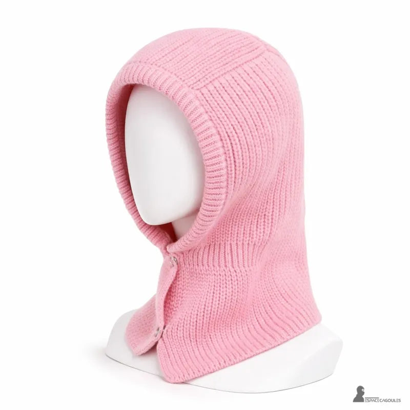 Passamontagna anni '90 rosa in maglia su manichino vista di profilo con lavorazione a coste e finitura rétro - Spazio Cagoule