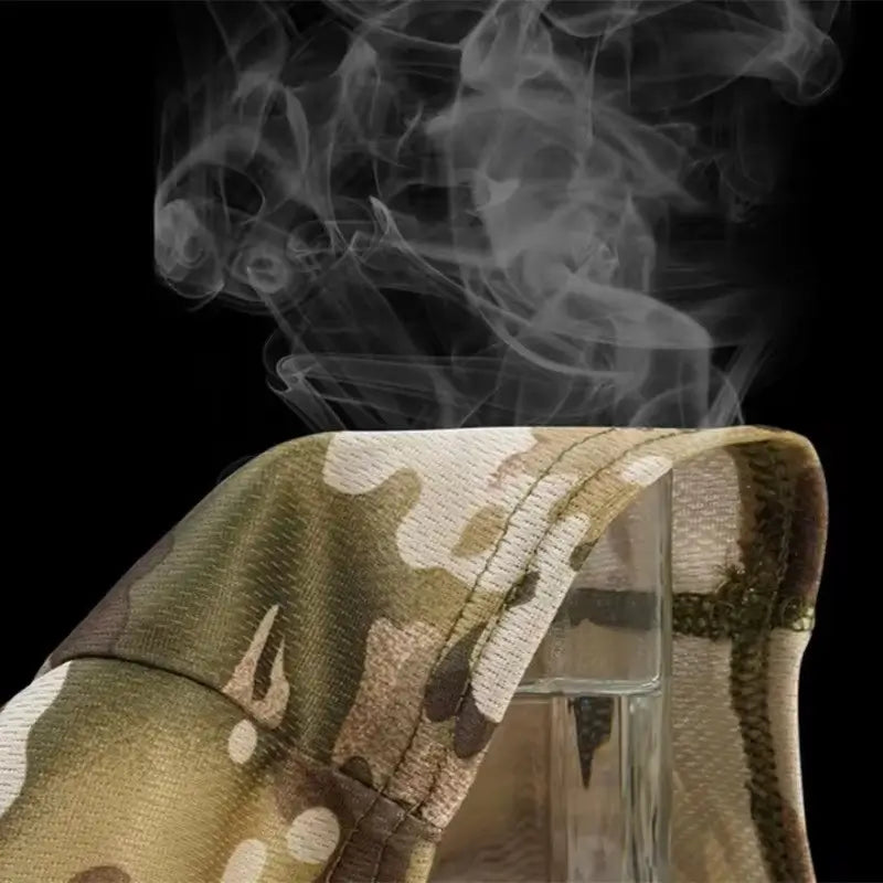 Breathable military camouflage balaclava with steam showing excellent ventilation.