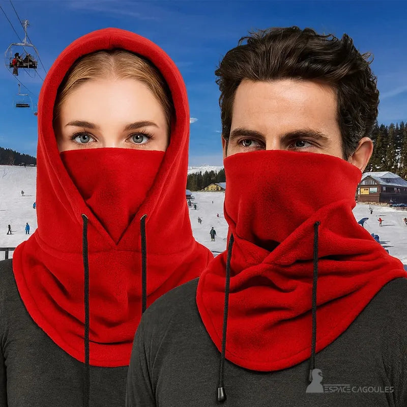 Red hood worn by a man and a woman in a ski resort, ideal for winter sports and outdoor activities