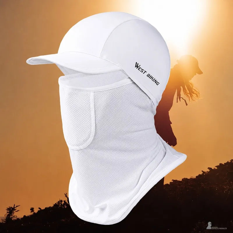 Cagoule casquette femme portée face à un coucher de soleil - Espace Cagoules