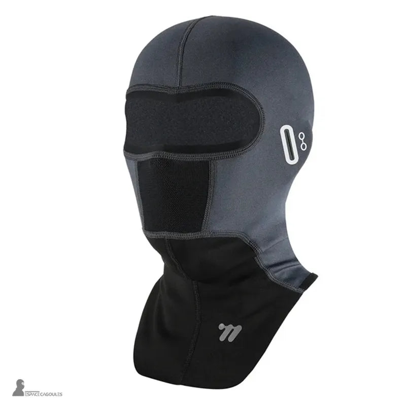 Ski mask with thermal breathable fabric in gray and black, full shape with face opening, side view on a white background - Cagoules Space
