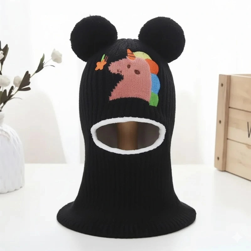 Cagoule enfant 4 ans bleue marine en laine douce avec oreilles rondes et broderie licorne colorée.