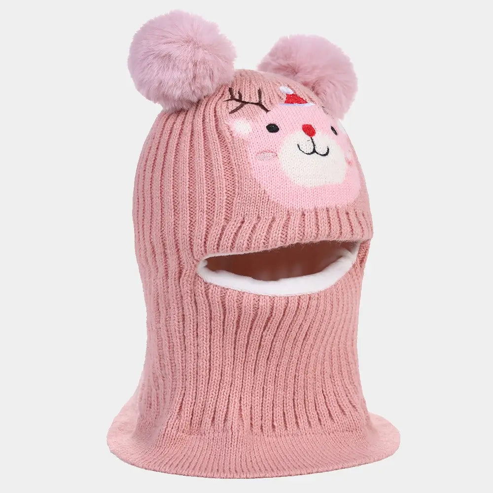 Cagoule enfant 5 ans en tricot rose avec pompons, doublure douce et motif de renne festif, idéale pour l'hiver et les activités en plein air.