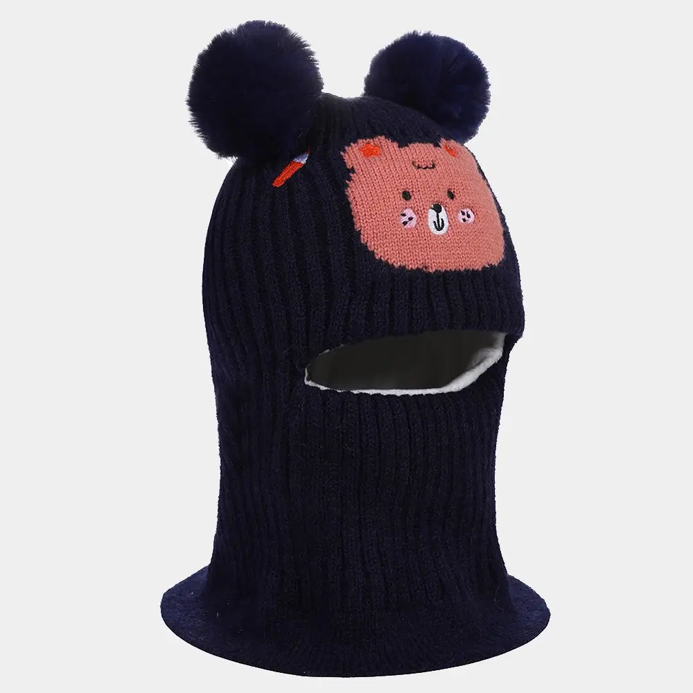 Cagoule enfant 5 ans en tricot bleu marine avec pompons, doublure chaude et motif ours rose, parfaite pour l'hiver et les activités extérieures.