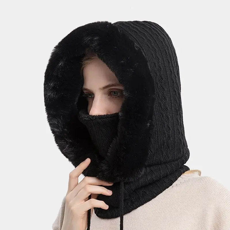 Cagoule femme fourrure noire avec tricot élégant et doublure en fausse fourrure, idéale pour une protection chic et chaude durant l'hiver.