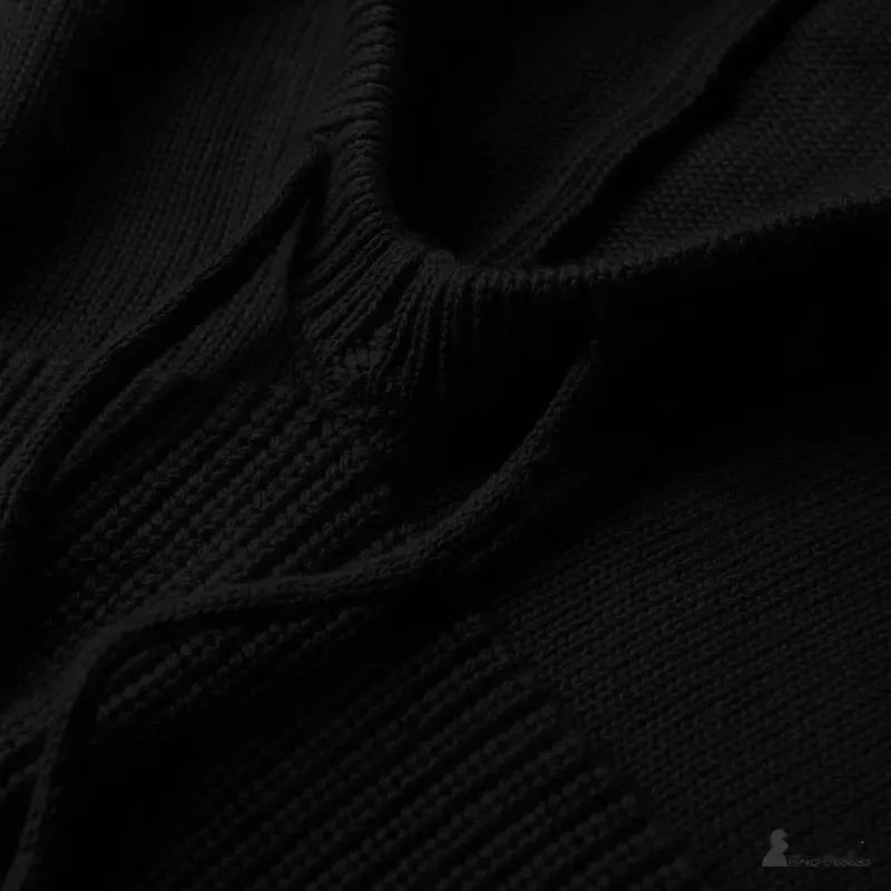 Women's balaclava winter black close-up detail on warm knit collar and wool cords