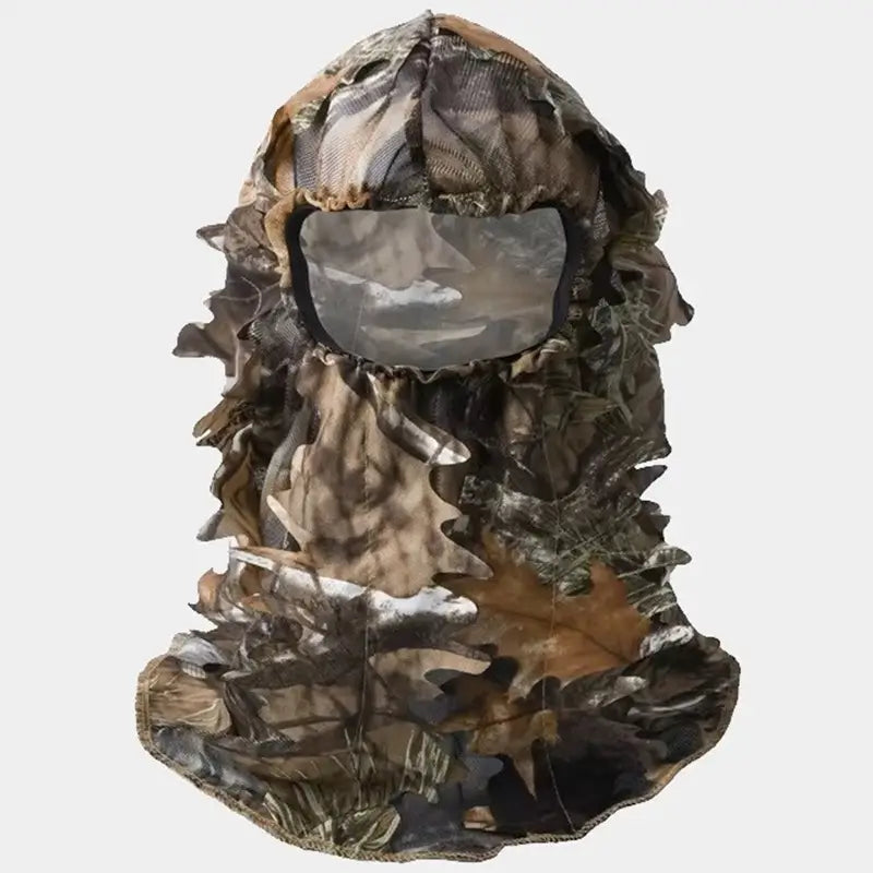 Full camouflage net balaclava with realistic leaf and branch pattern, designed for maximum discretion in natural environments. Ideal for hunting, wildlife watching.