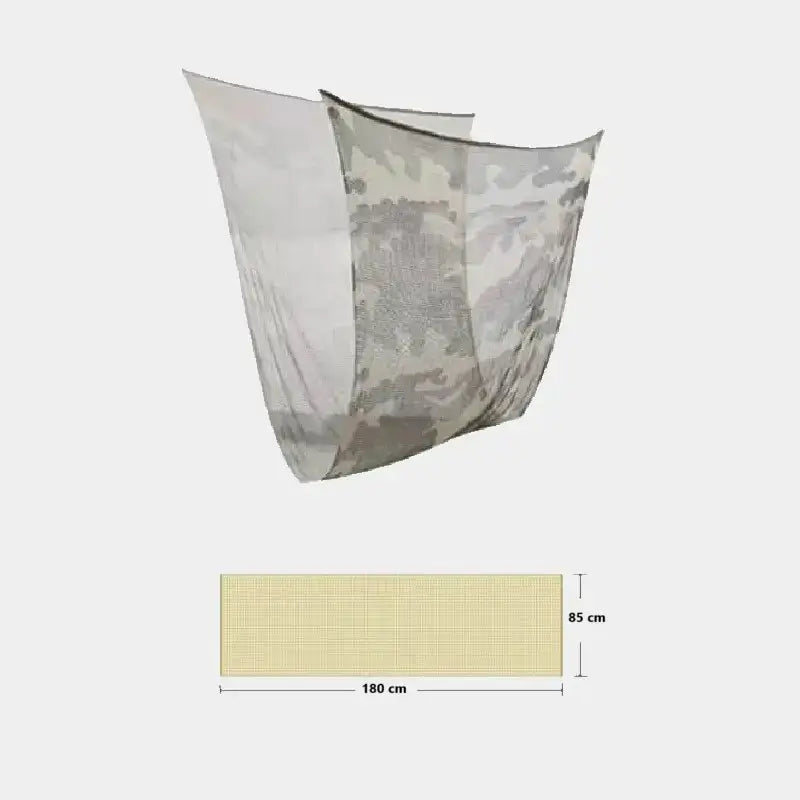 Rectangular camouflage net balaclava measuring 180 cm long and 85 cm wide, with a beige and green camouflage pattern, illustrated hanging to highlight its transparency and lightness.