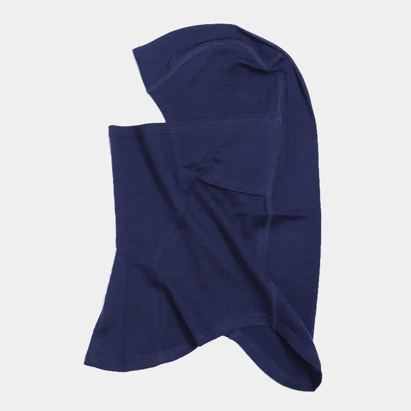 Cagoule en laine mérinos bleue, vue latérale gauche, pour motard, offrant protection contre le vent et le froid durant les trajets hivernaux.