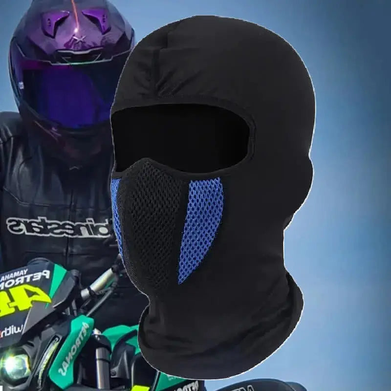 Black and blue Lycra motorcycle balaclava worn by an equipped biker. Full face protection with breathable mesh area.
