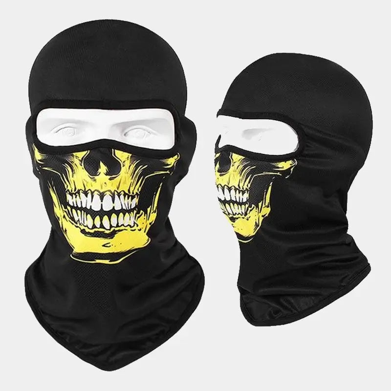 Cagoule Moto TĂȘte de Mort noire avec imprimĂ© crĂąne jaune et blanc. MatiĂšre stretch et respirante, parfaite pour une protection contre le vent et la poussiĂšre en moto.