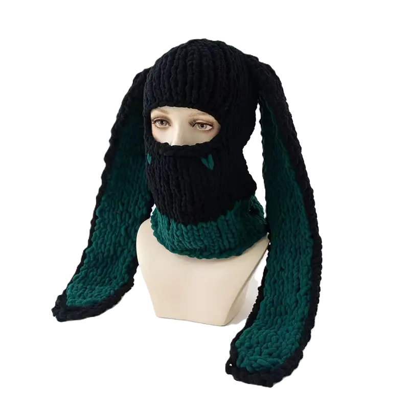 Black and Green Rabbit Ears Balaclava on Mannequin â A soft mesh black and green balaclava with long rabbit ears lined in pastel pink. Perfect for facing winter with a kawaii touch.