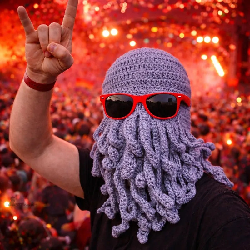 Person wearing a gray knitted octopus hood at a festival with a crowd in the background - Hood Space