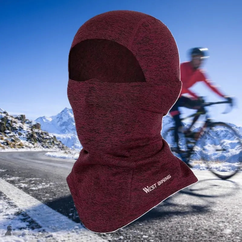 Cykelhjälmsbalaclava bärs av en cyklist på en vinterbergsväg, ansikts- och nackskydd, hjälmkompatibel, Espace Cagoules.
