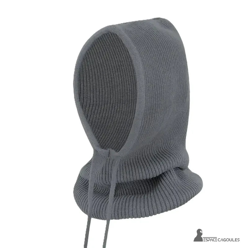 Dark grey women's knitted balaclava posed alone on a white background, side view