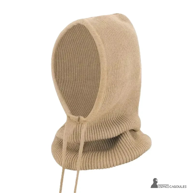 Light beige women's knitted balaclava posed alone on a white background, side view
