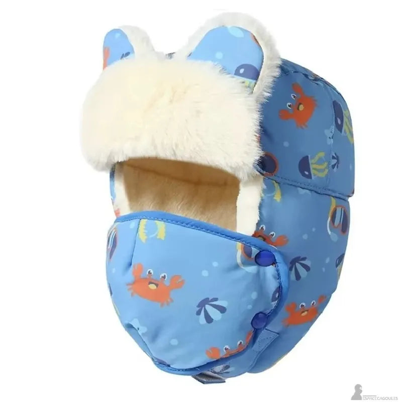 Vue de face de la chapka enfant garçon avec masque bleu motifs marins et oreilles décoratives - Espace Cagoules