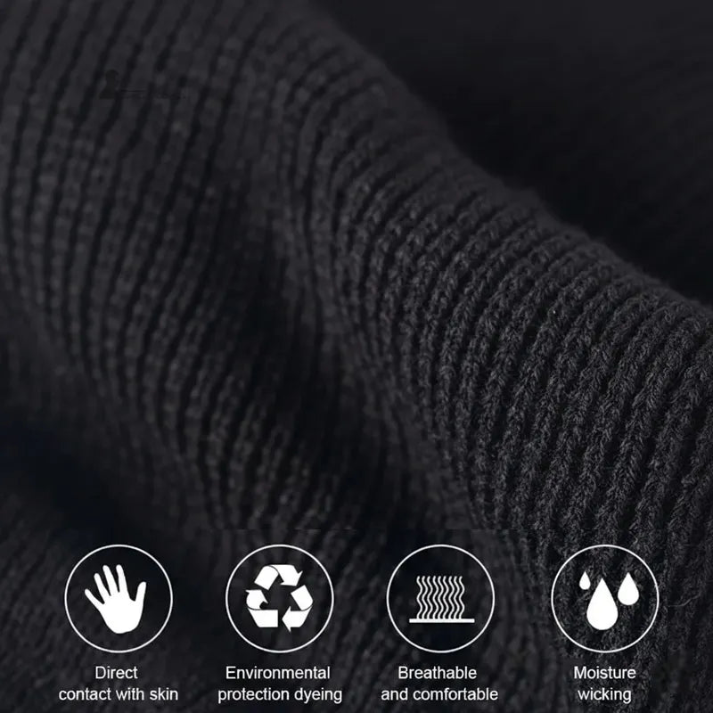 Passe Montagne Cagoule tissu noir en maille extensible, gros plan sur la texture respirante, douce au contact de la peau et évacuant l’humidité.