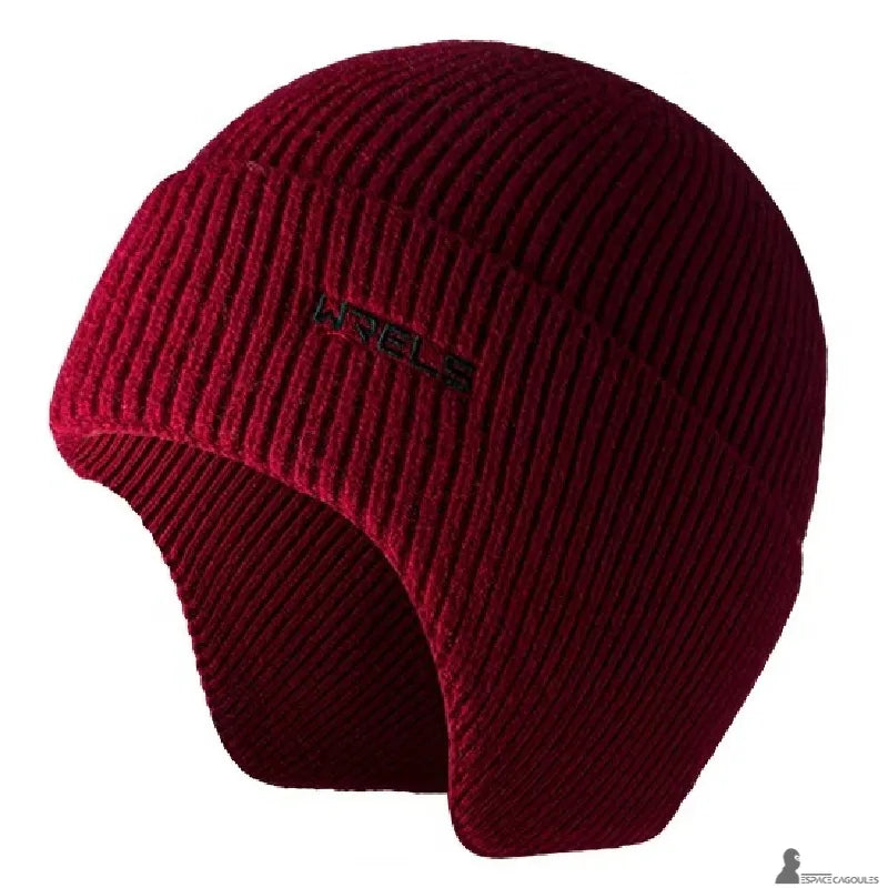 Balise alt
Bonnet sous casque ski rouge bordeaux en fibre acrylique et polyester tricotée, forme ajustée avec protection des oreilles, vue de profil sur fond blanc - Espace Cagoules