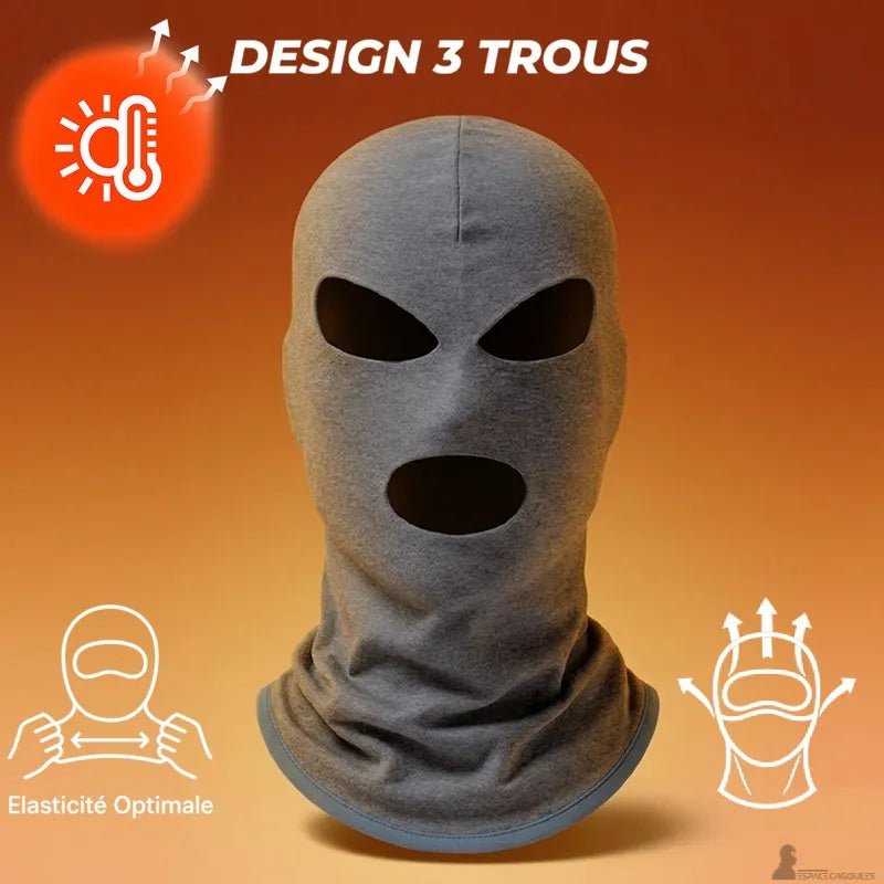 Cagoule 3 trous en polaire grise avec mention design 3 trous, vue de face sur fond dégradé orange avec pictogrammes techniques - Espace Cagoules