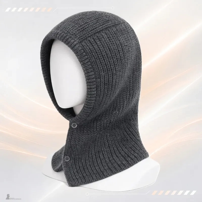Dunkelgraue Romy 90er-Sturmhaube aus Rippenstrick auf Mannequin mit seitlichem Druckknopfverschluss - Espace Cagoules