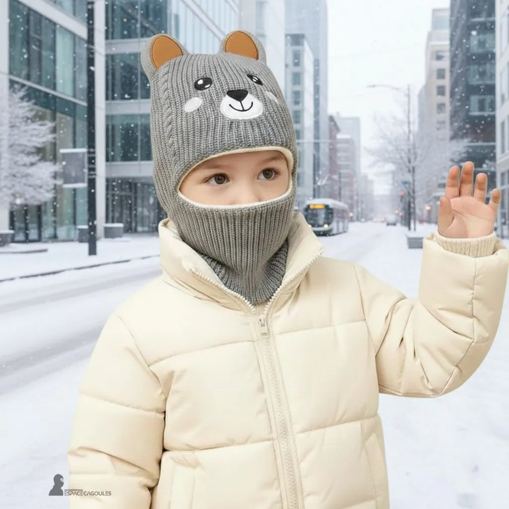 Balaclava for children 5 years old wearing a grey bear balaclava on a snowy urban street ensuring warmth and comfort during the winter – Espace Cagoules