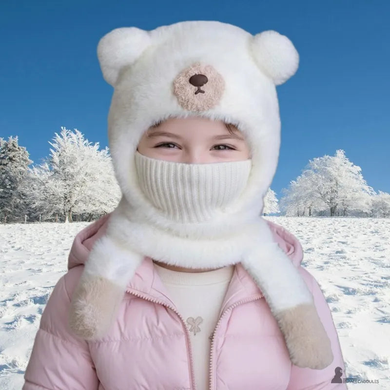 White 3-in-1 children's balaclava with a raised face opening, shown worn by a child outdoors in a snowy setting - Espace Cagoules.