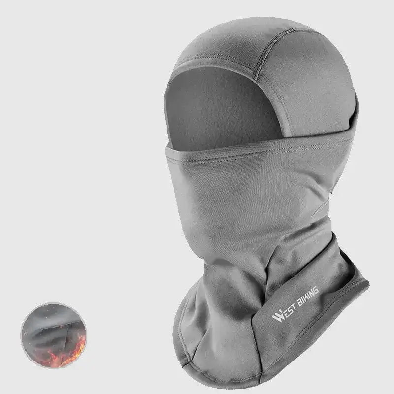 Cagoule hiver pour moto grise avec doublure thermique résistante au froid, offrant une protection optimale pour les motards.