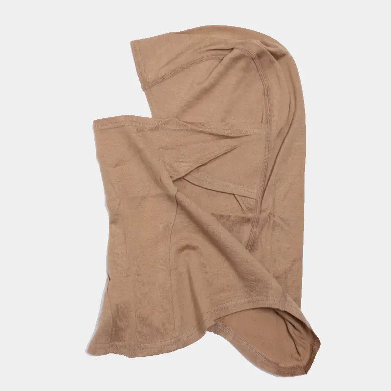 Cagoule en laine mérinos beige clair, vue latérale gauche, conçue pour les motards cherchant une protection thermique et un style discret.