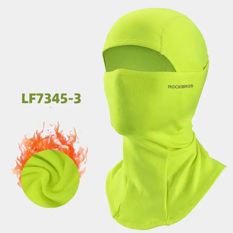 Cagoule moto femme jaune fluo, avec un tissu thermique et respirant, offrant une visibilité accrue et une protection maximale lors des trajets en moto par temps froid.