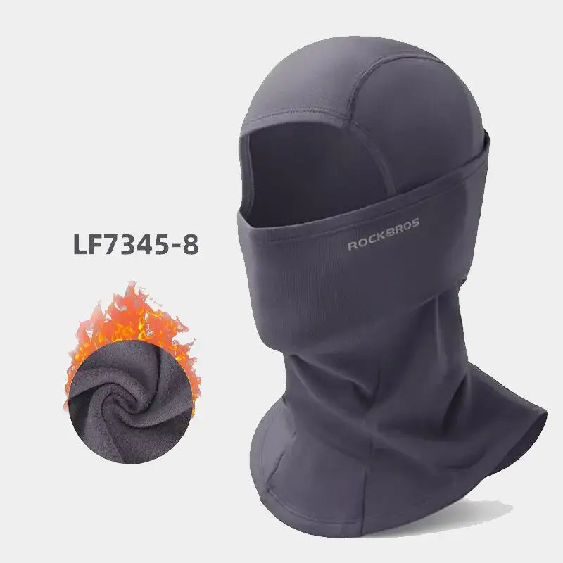Cagoule moto femme noire, élégante et discrète, avec une doublure thermique pour une isolation optimale et une protection intégrale contre le froid.