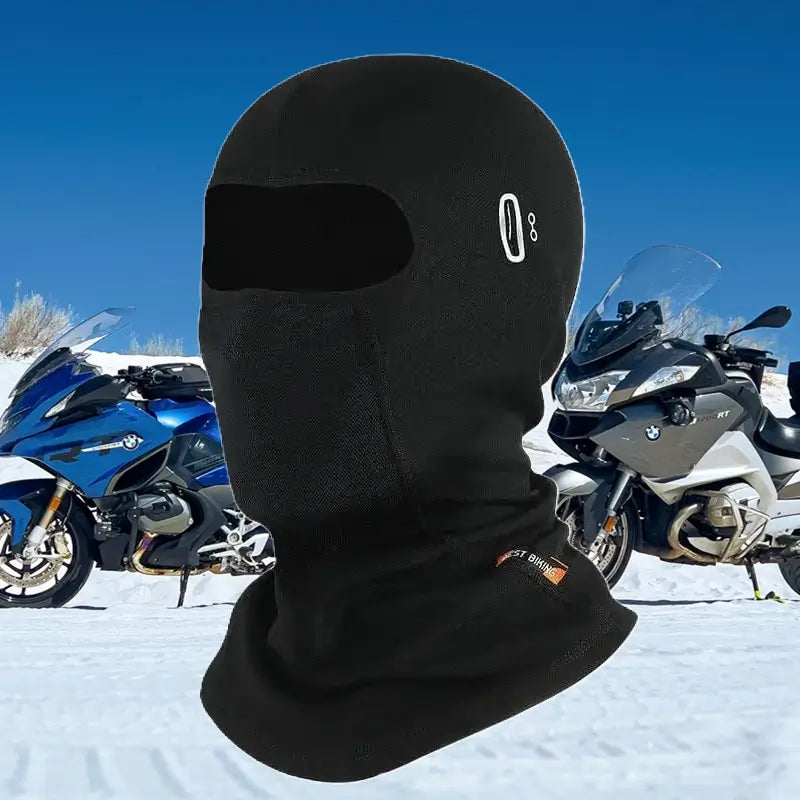 Cagoule moto hiver noire avec ouverture 1 trou pour les yeux, design thermique et protection contre le froid, idéale pour les motards en conditions hivernales.