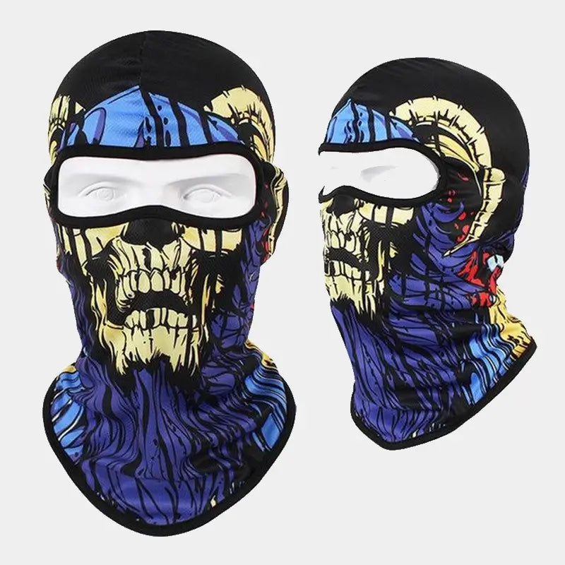 Cagoule Moto Tête de Mort noire avec imprimé crâne jaune et bleu. Conception extensible et coupe-vent, adaptée aux longues virées à moto.