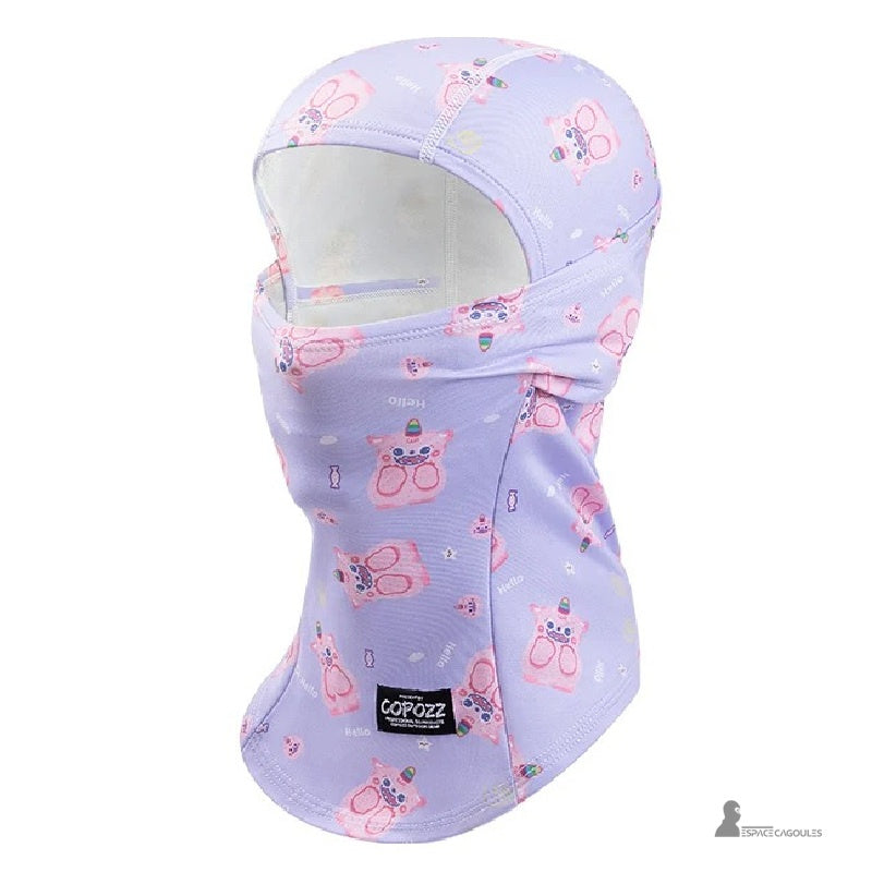Cagoule ski fille violette à motif d’ours rose et d’arc-en-ciel, présentée sur fond clair, idéale pour le ski et les jeux dans la neige.