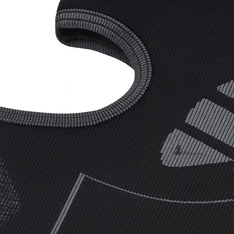 Black men's ski mask seen in macro with an oval face opening, featuring visible stitching and a gray graphic pattern on the side - Cagoules Space.