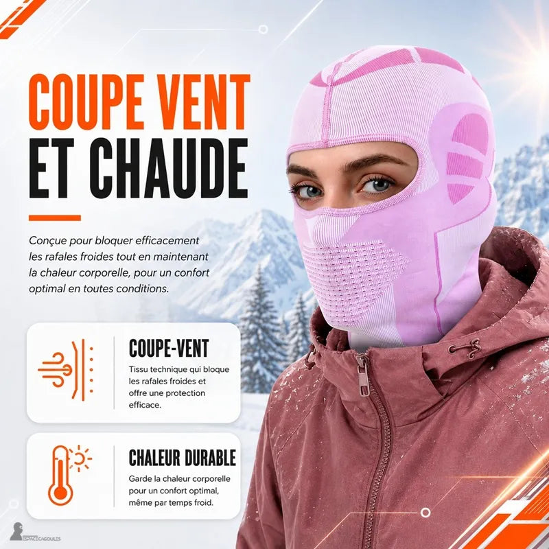 Skieuse portant la cagoule de ski rose SnowRose coupe-vent qui protège le visage des rafales froides - Espace Cagoules