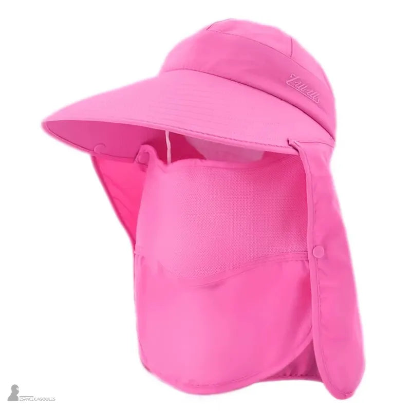 Casquette saharienne femme rose et masque de protection portés lors d'une promenade ensoleillée - Espace Cagoules