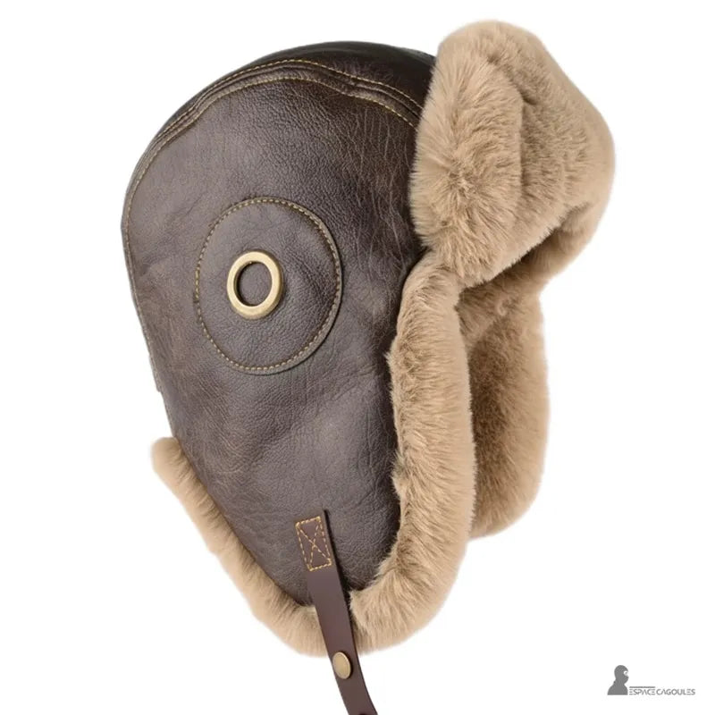 Chapka aviateur en cuir marron et fausse fourrure beige, vue de profil droit avec oreillette rabattable - Espace Cagoules