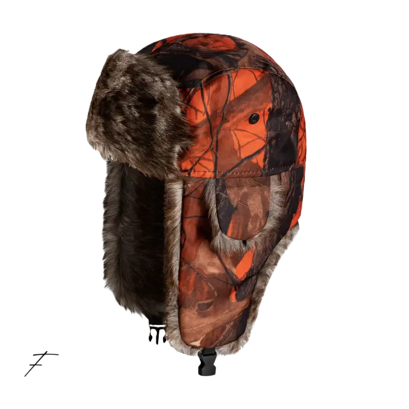 Chapka Chasse camouflage orange et noir, intérieur doublé de fourrure marron, idéale pour la chasse en forêt avec visibilité renforcée.